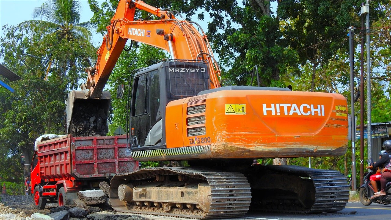 Highway Repair Construction Excavator Trucks Digging Up Old Asphalt Layer