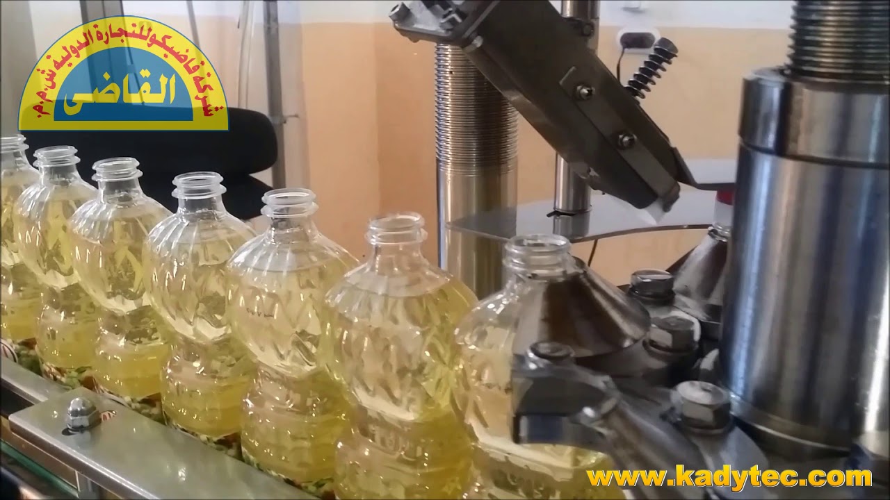 ماكينات تعبئة و غلق عبوات زيت الطعام أوتوماتيك