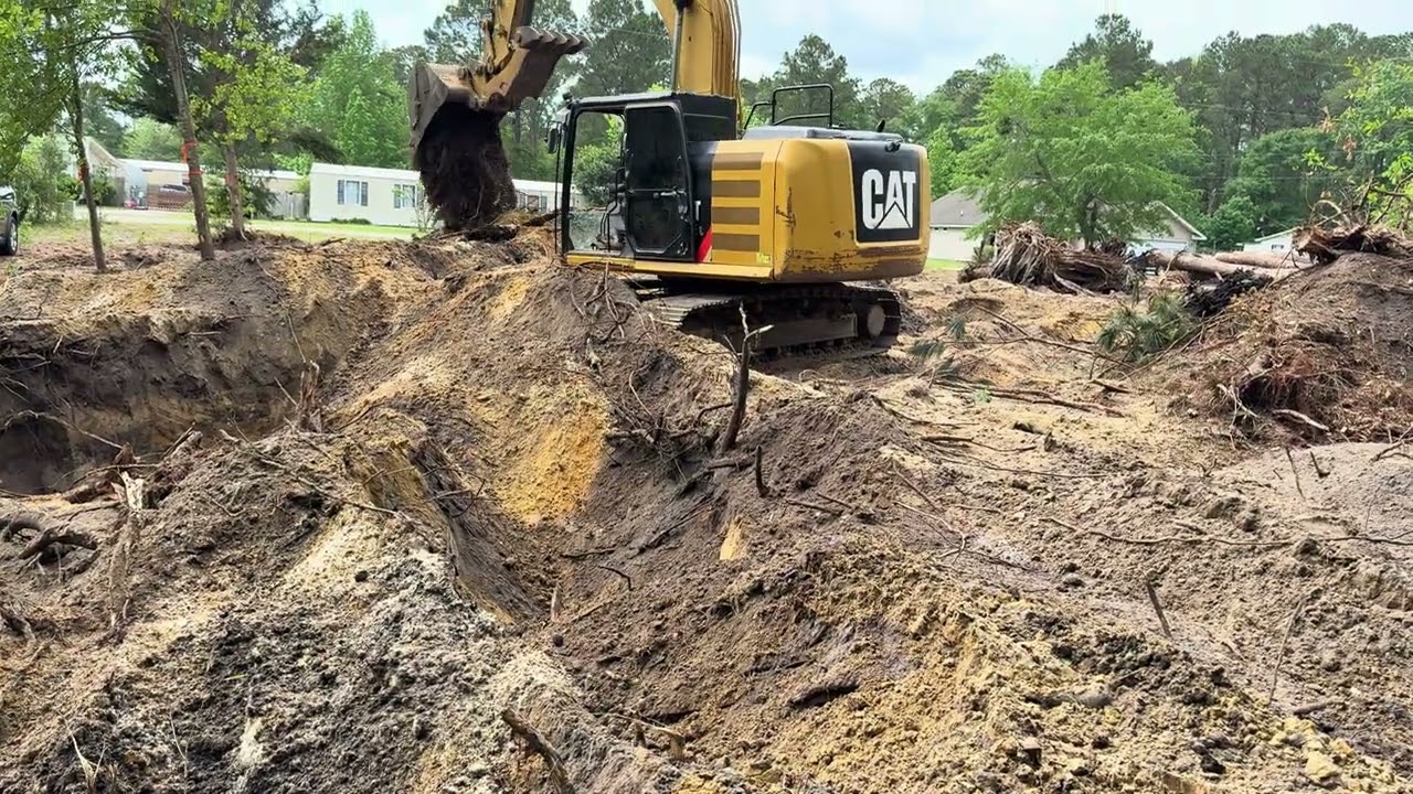 Pulling stumps with a 2016 cat 316 excavator