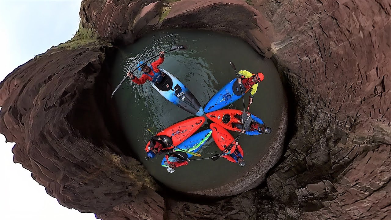 Kayaking Seaton Cliffs and the cave systems near Arbroath