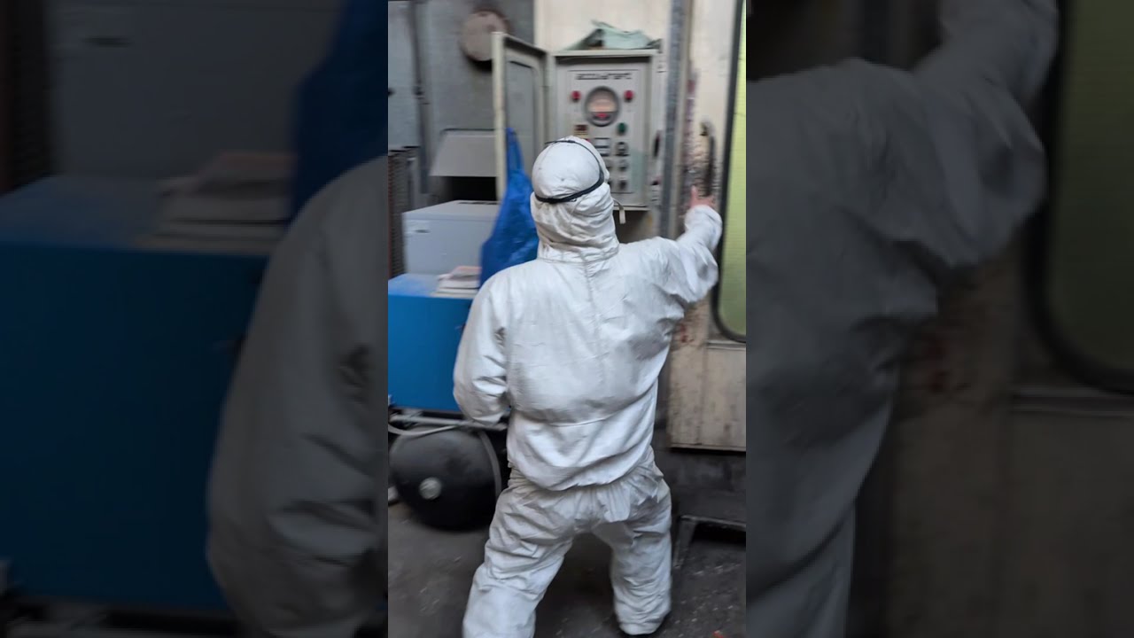 Tiny Masterpiece: Pint-Sized Painter’s Toyota Corolla in the Spray Booth