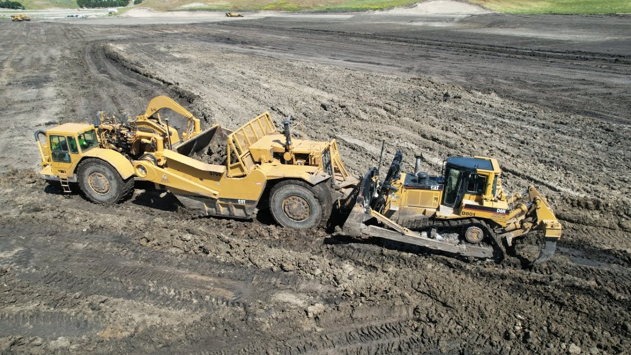 Cat D8 Pushing 657 Scrapers