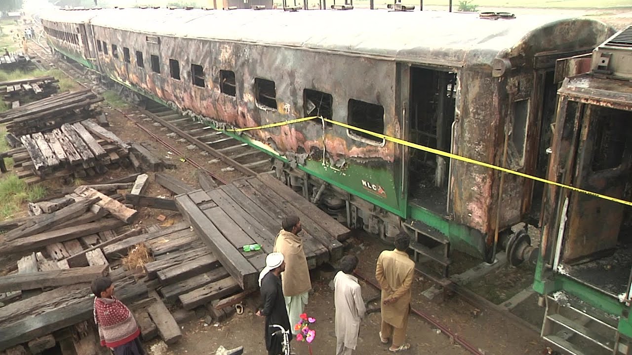 Funerals begin as town mourns victims of Pakistan train fire | AFP