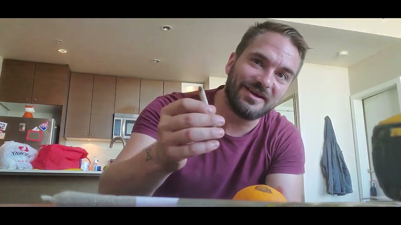 Smoking weed from an Orange
