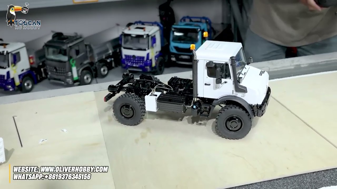 Подробный обзор новой радиоуправляемой гусеничной машины Unimog U4023 от LESU в масштабе 1/14