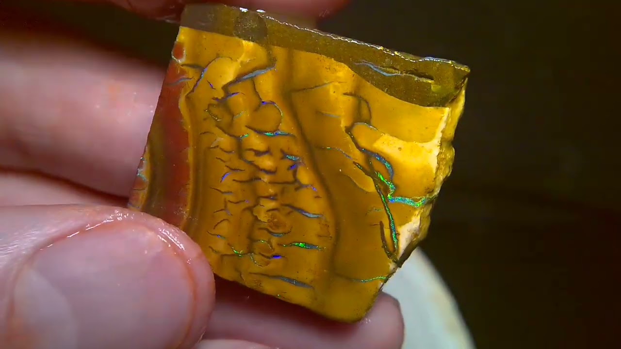1425cts colourful Boulder opal rough parcel, 10 pieces in total