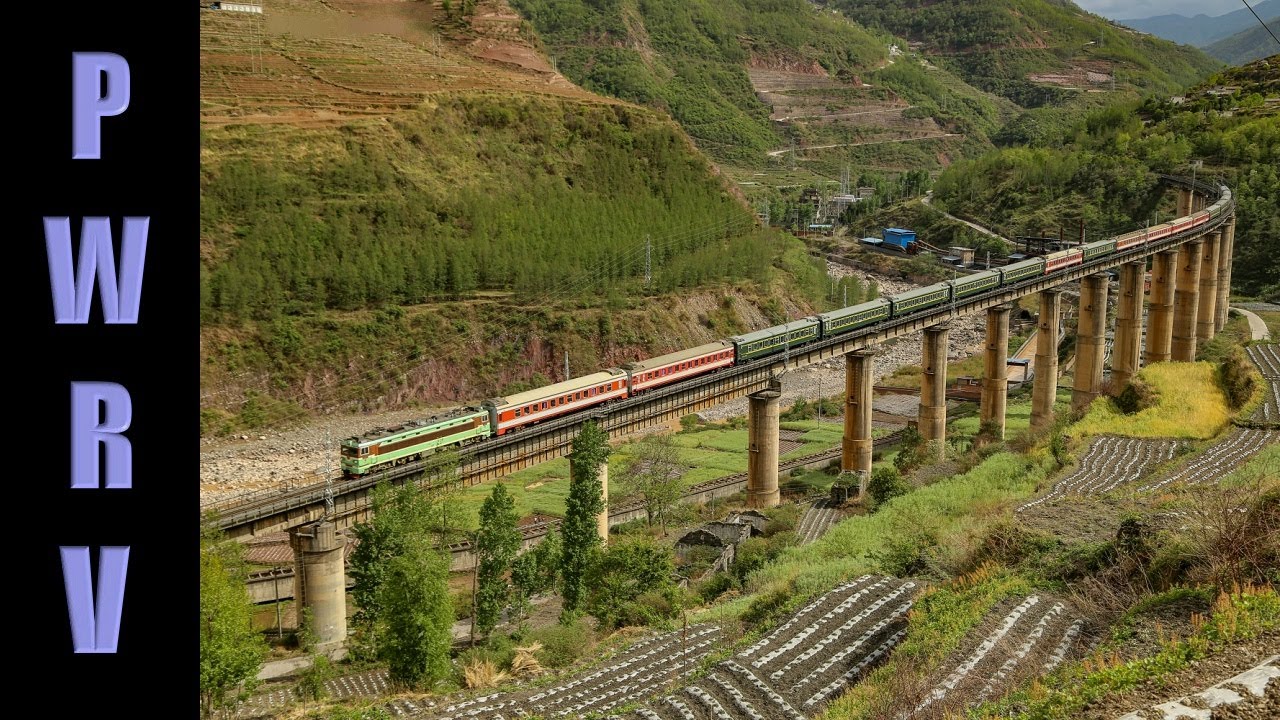 Chinese Railways - Chengdu-Kunming mainline action at Yuexi. SS4, SS3 & SS7C electric locomotives