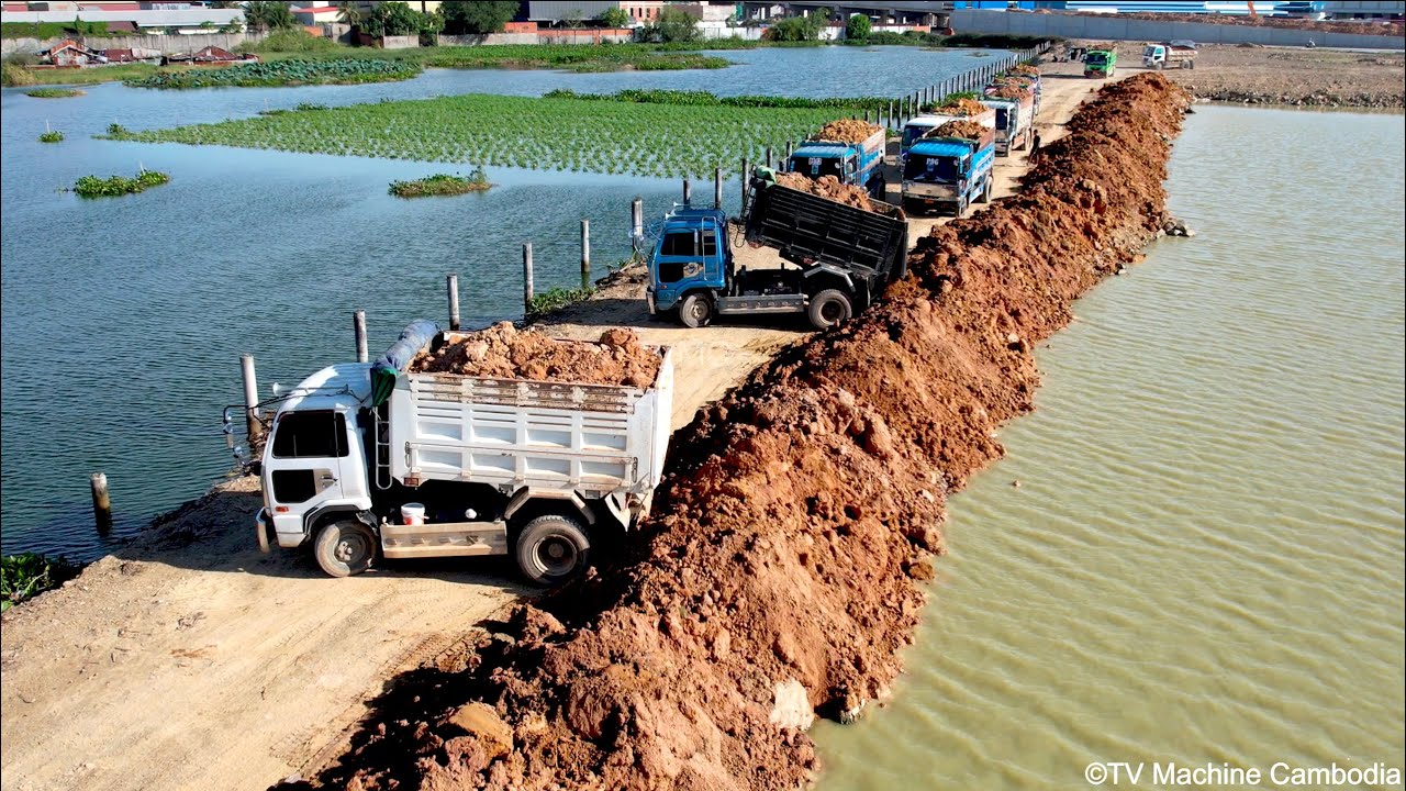 Wonderful COMBINE Backfilling Construction Of Machinery Team Dozer & Truck 5T Spreading Into Water