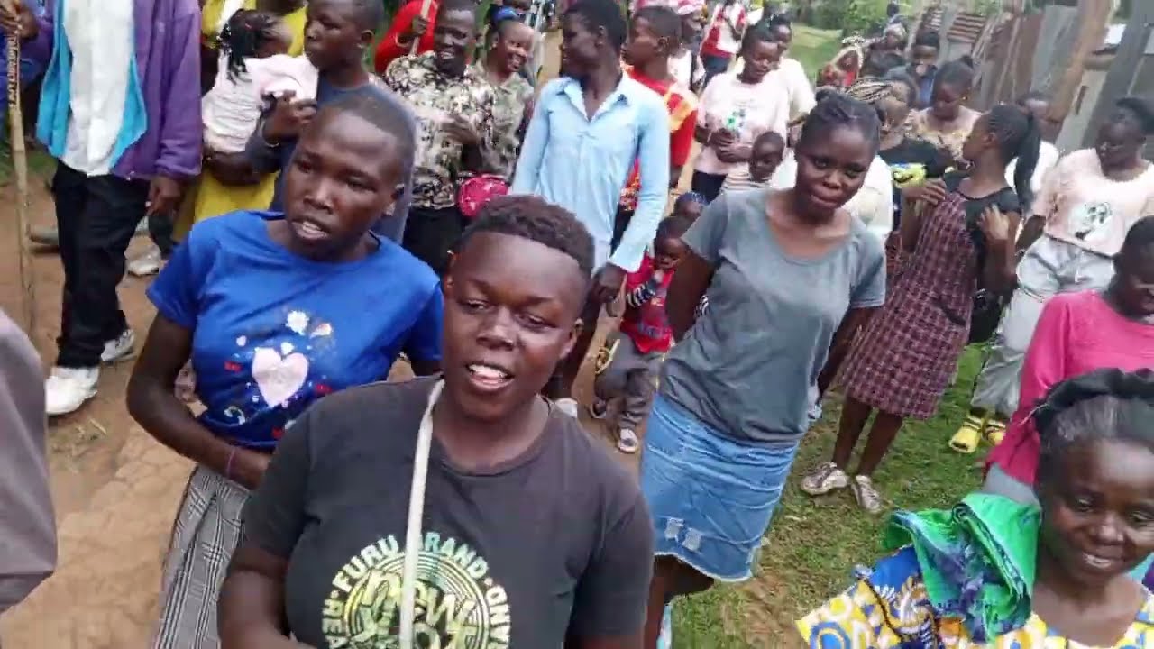 Maragoli initiates get a heroic welcome after circumcision... Kenya village life Oscar Gavala