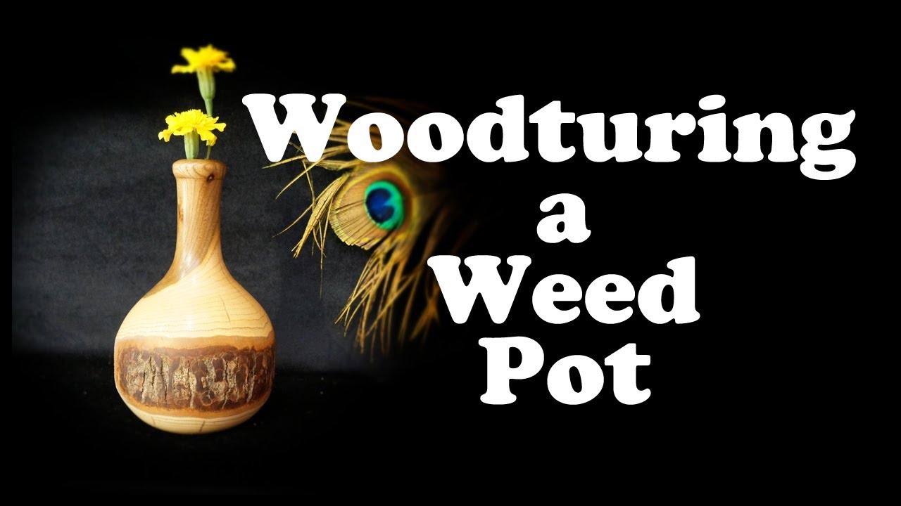 Woodturning a weed pot with a glass tube in it  !
