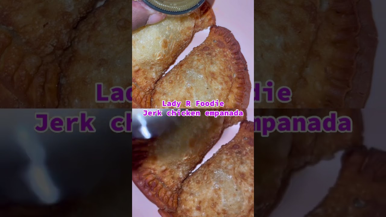 Jerk chicken empanada with a jerk sauce 
