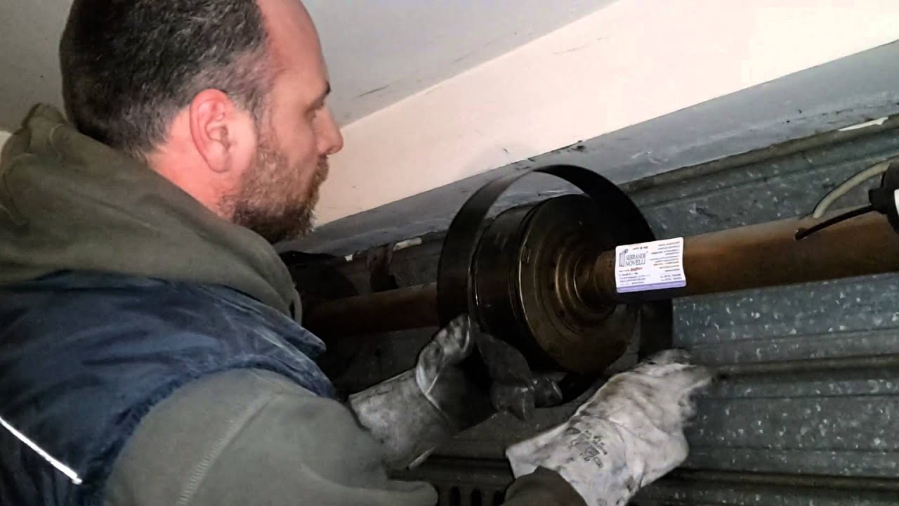 NOVELLI SRL Sostituzione molla serranda avvolgibile. Fares Tony. NOVELLI SERRANDE E PORTE DA GARAGE.