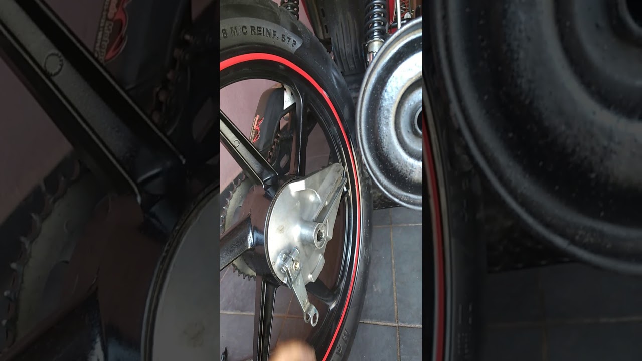 Roda trazeira trava no aperto CG150