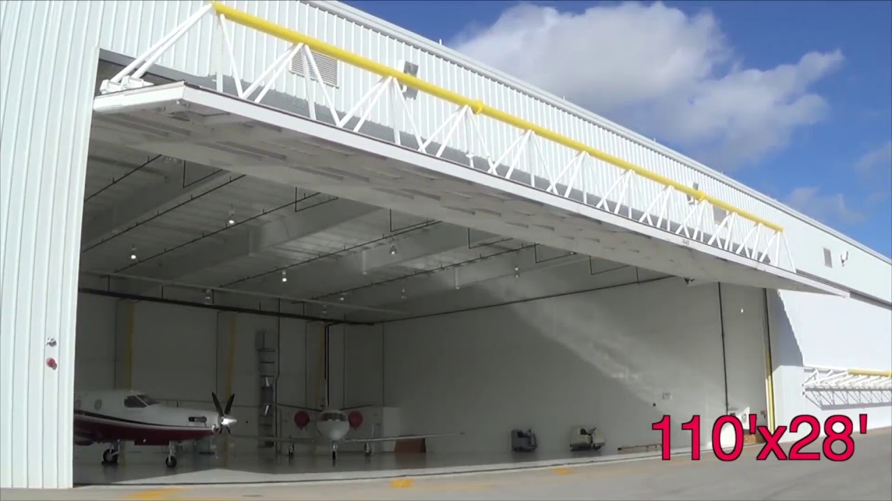 Hangar Door dimensions 110 ft x 28 ft - by Higher Power Hangar Doors