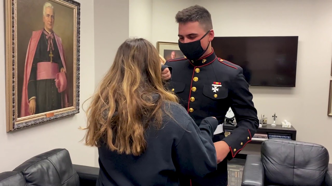 Marine Jacob Katsur '20 surprises sister while home on leave.