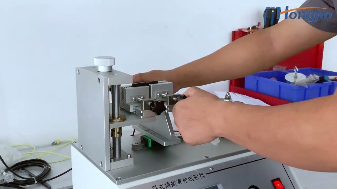 Horizontal mating and extraction life tester 