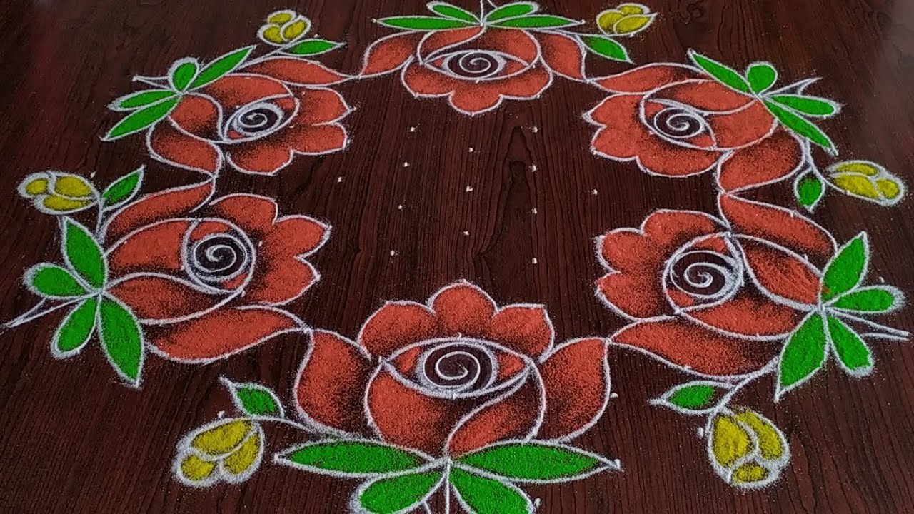 Sankarthi chukkala muggulu(13×7) Dot's.  beautiful roses rangoli