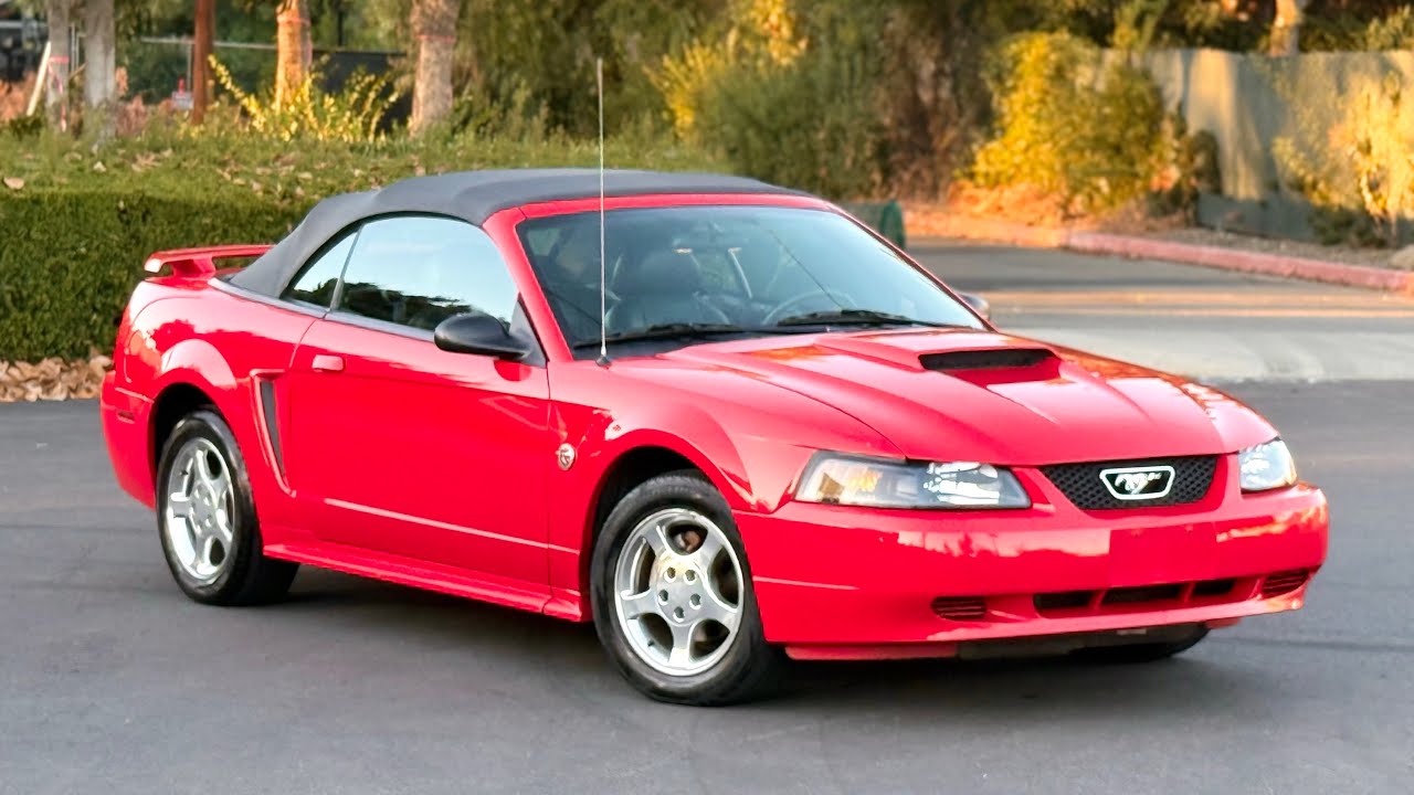 2004 Ford Mustang….low 49k miles….40th anniversary edition ! Torch red mustang 
