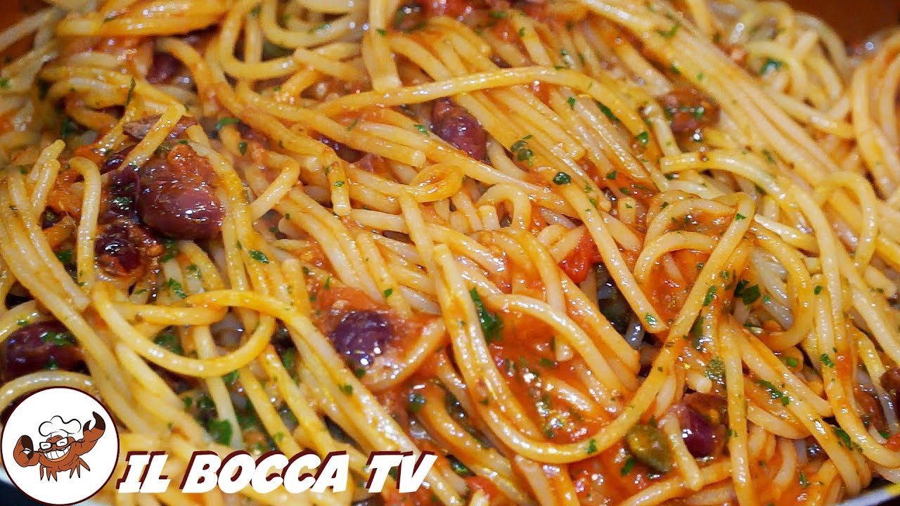 297 - Spaghetti alla puttanesca...e l'estate è bella fresca! (primo piatto facile veloce e saporito)