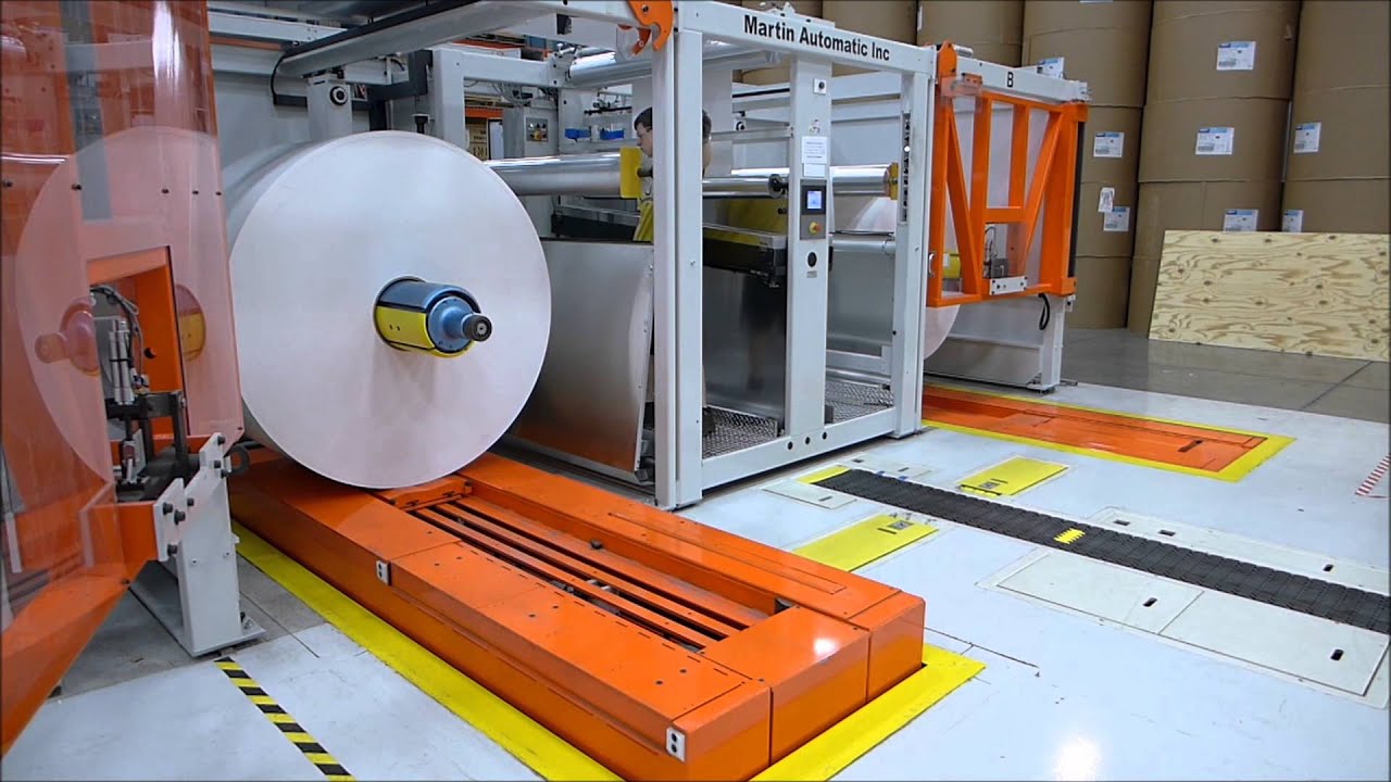 Harmax Segmented belt delivers rolls to Martin Automatic Splicer