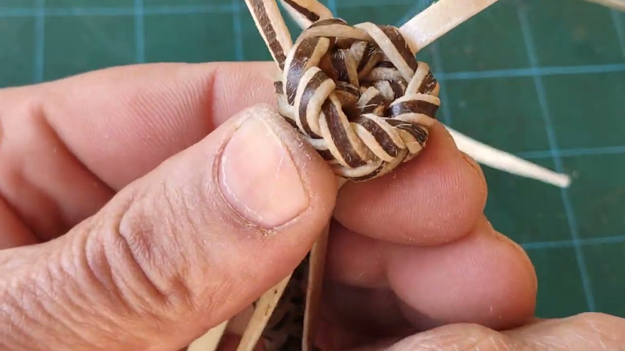 Botão com 6 tentos .
