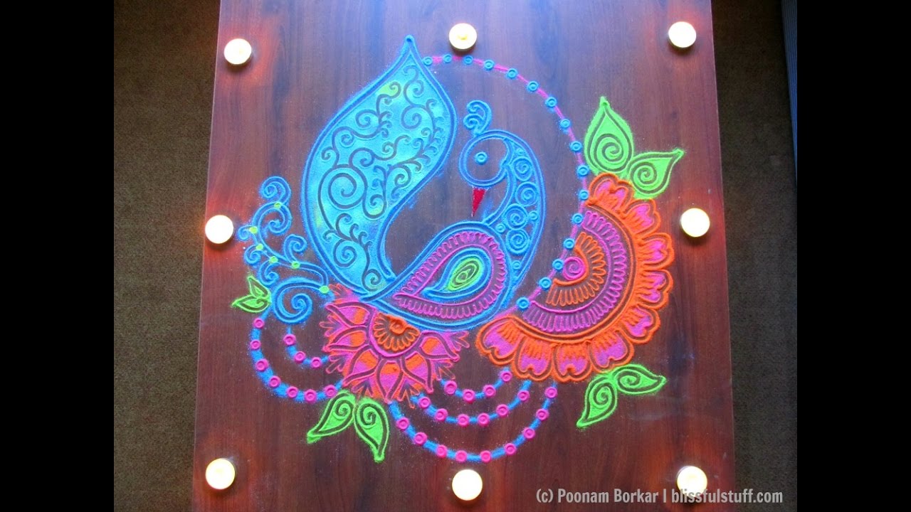 Easy and beautiful peacock rangoli | Innovative rangoli designs by Poonam Borkar