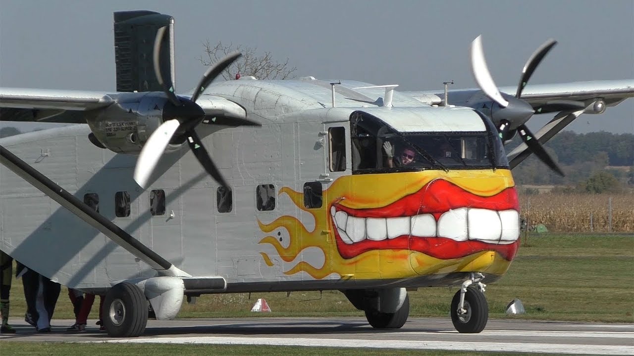 Pink Skyvan Short SC-7 Skyvan takeoff at Airfield Punitz | OE-FDK