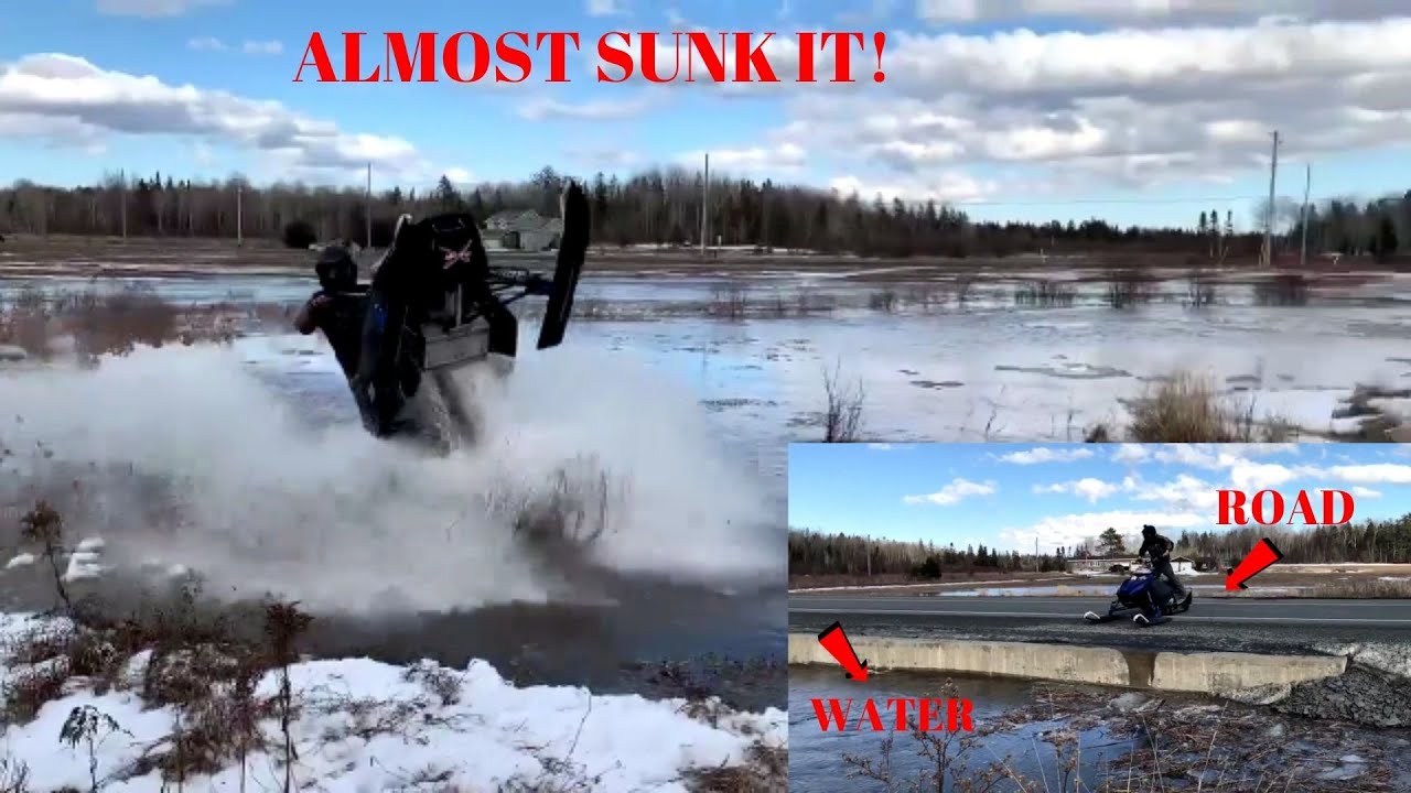 SNOWMOBILE WATER SKIPPING || ALMOST SUNK THE SLED!