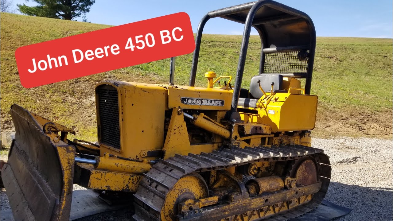 John Deere 450. Выпрямление изогнутой рамы гусеницы и восстановление натяжного механизма.