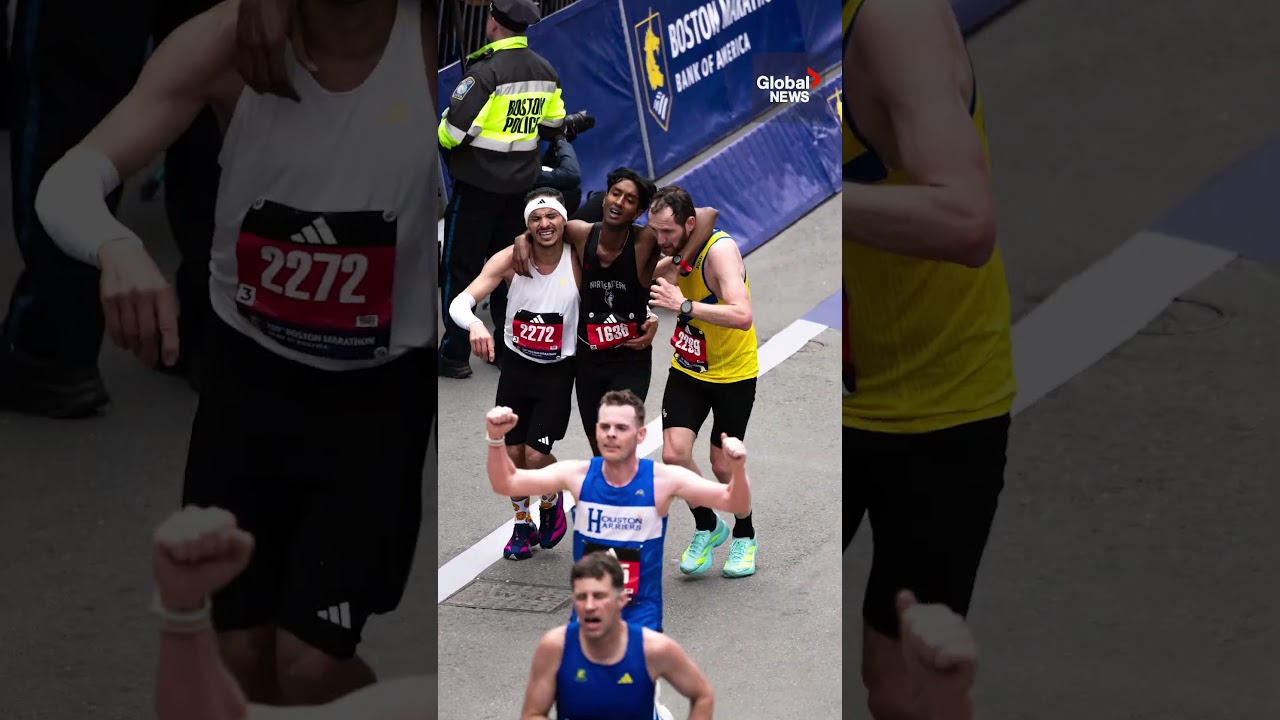 Boston Marathon runners give up time to help competitor cross finish line