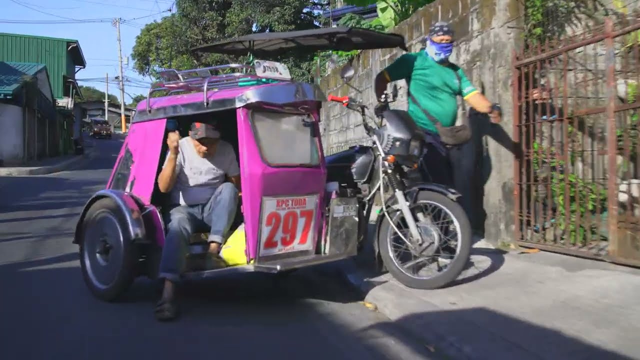 Philippines, tricycle ride from Prime Water to Starmall