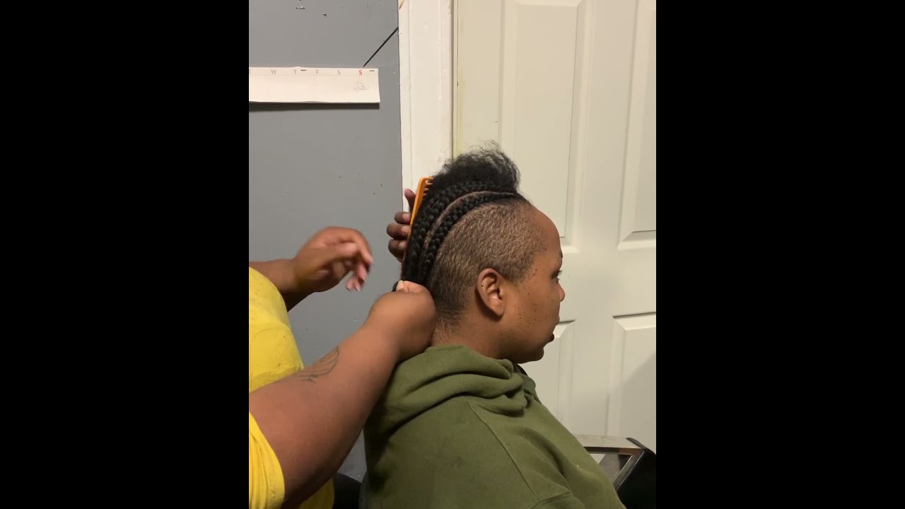 Shaved sides sew-in  curly Mohawk