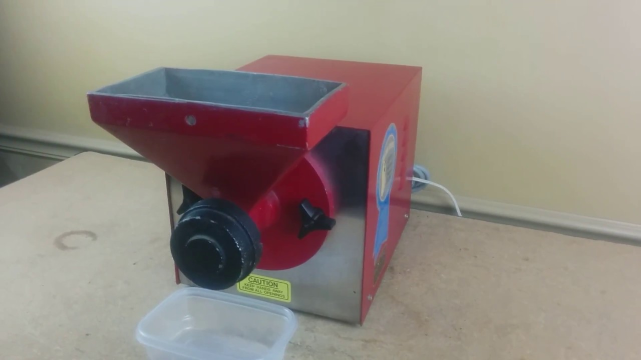 Olde Tyme Peanut Butter Machine PN1 Grinding Peanuts
