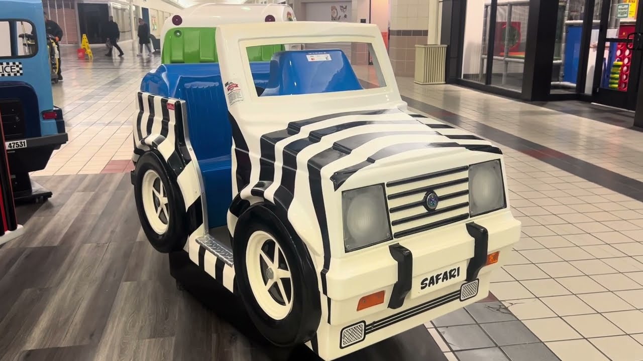 RG Mitchell 1996 safari Jeep kiddie ride at liberty tree mall