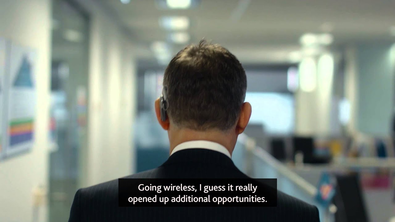 Businessman Optimizes His Hearing Experience with Cochlear Implants & True Wireless Accessories