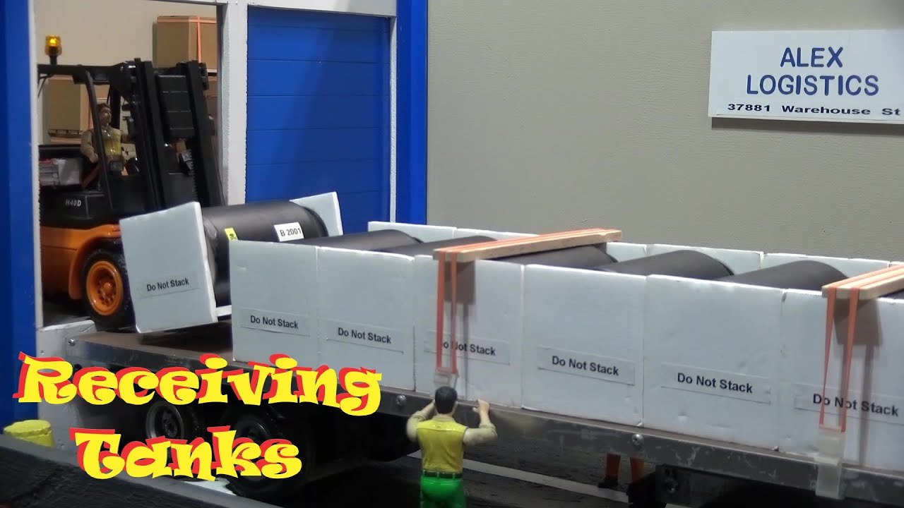 RC Forklift Unloading Tanks at Warehouse. RC Construction.