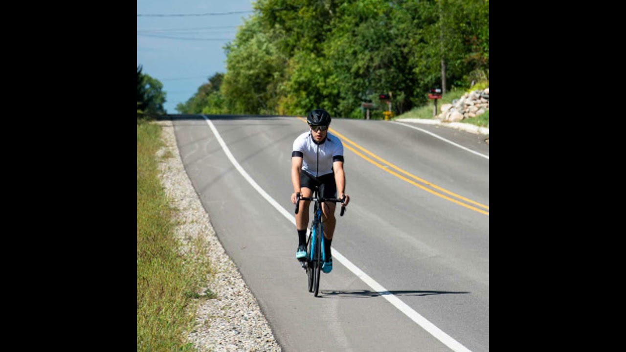 Cycling advocates mark a victory as Gov. Whitmer signs distracted driving bills