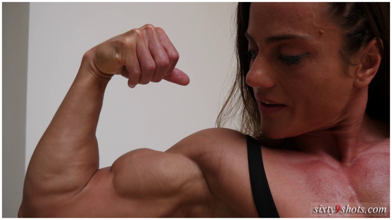 guluzar flexing biceps and pecs