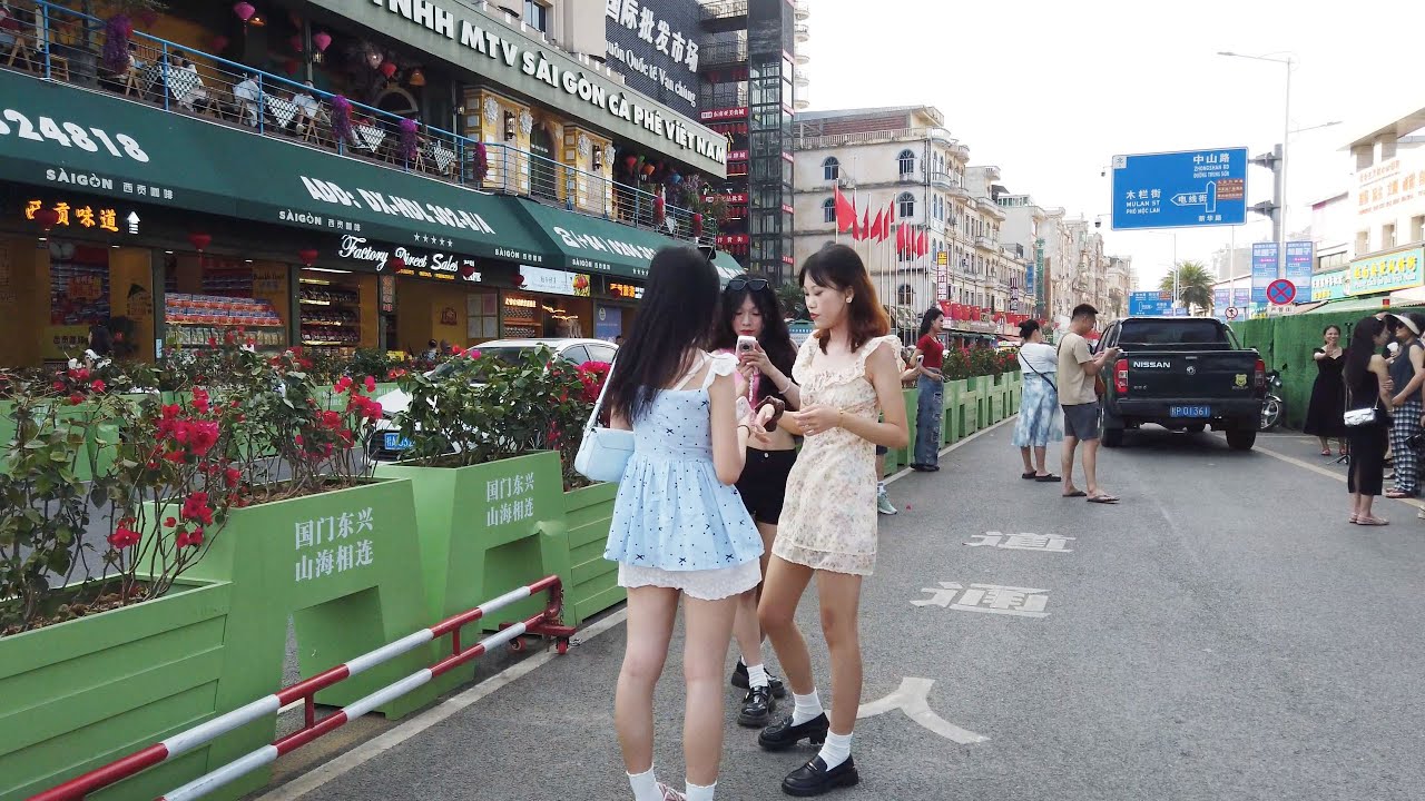 4K The Chinese border city of Dongxing, bordering Vietnam.Bicycle Tour GuangXi FangChengGang port