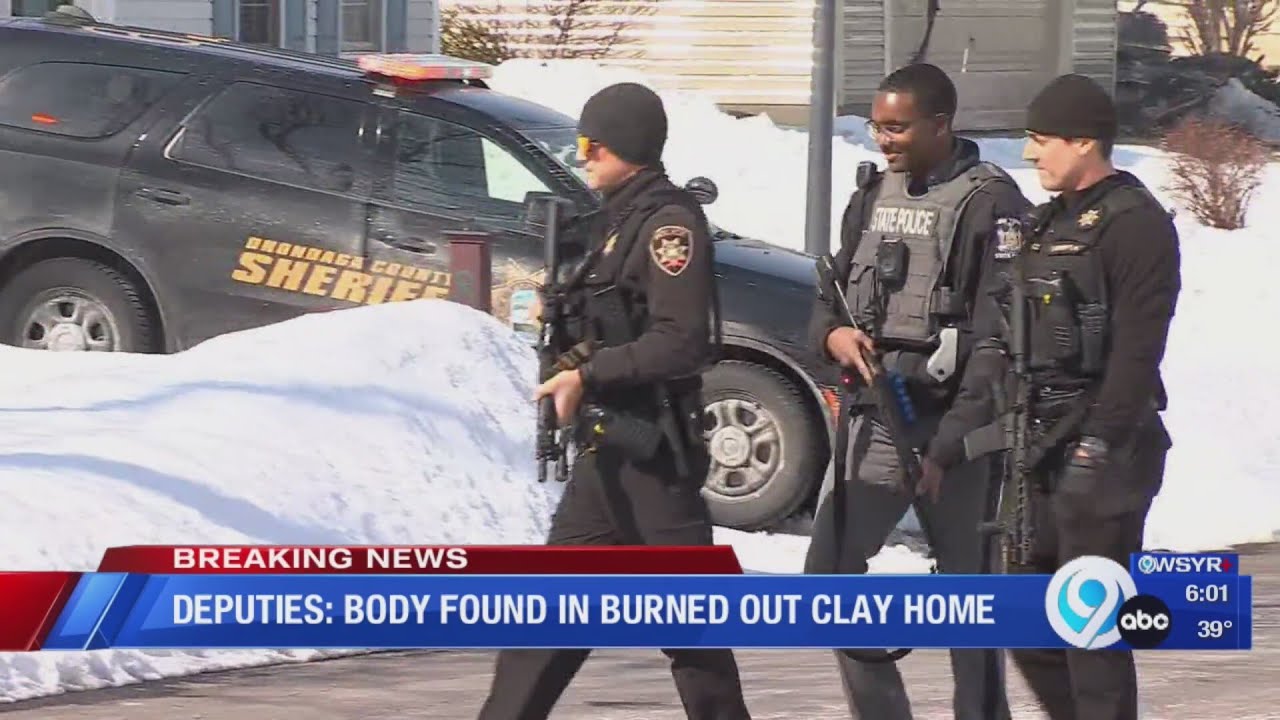 Police find body in burned out Clay home after manhunt