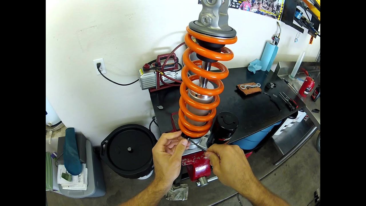 How to remove and install a KTM PDS shock spring.