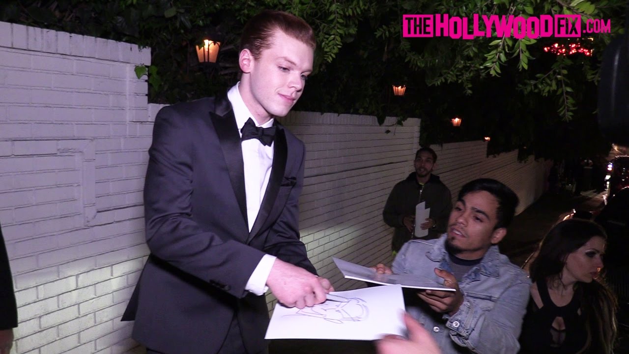 Cameron Monaghan Draws The Joker For Fans While Leaving The GQ Men Of The Year Party 12.8.16
