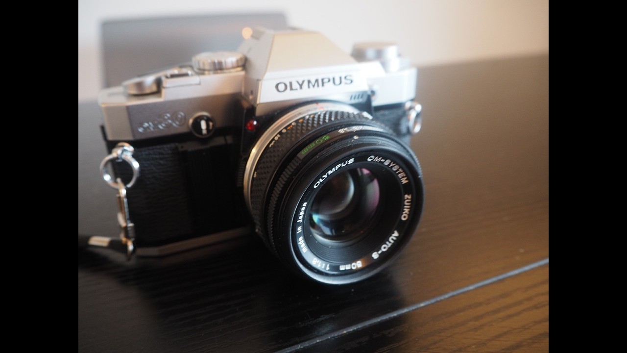 Olympus OM-30; этот остаётся у вас.