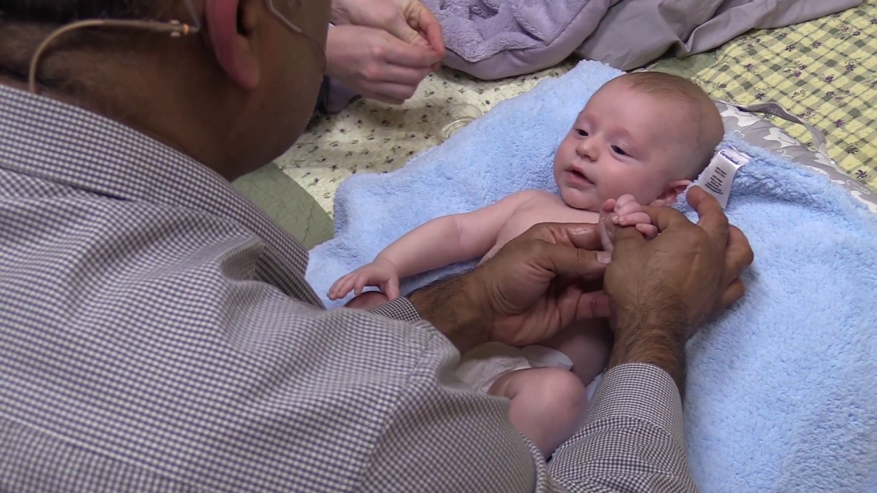Dr. T's Baby Massage Method, massaging the arm
