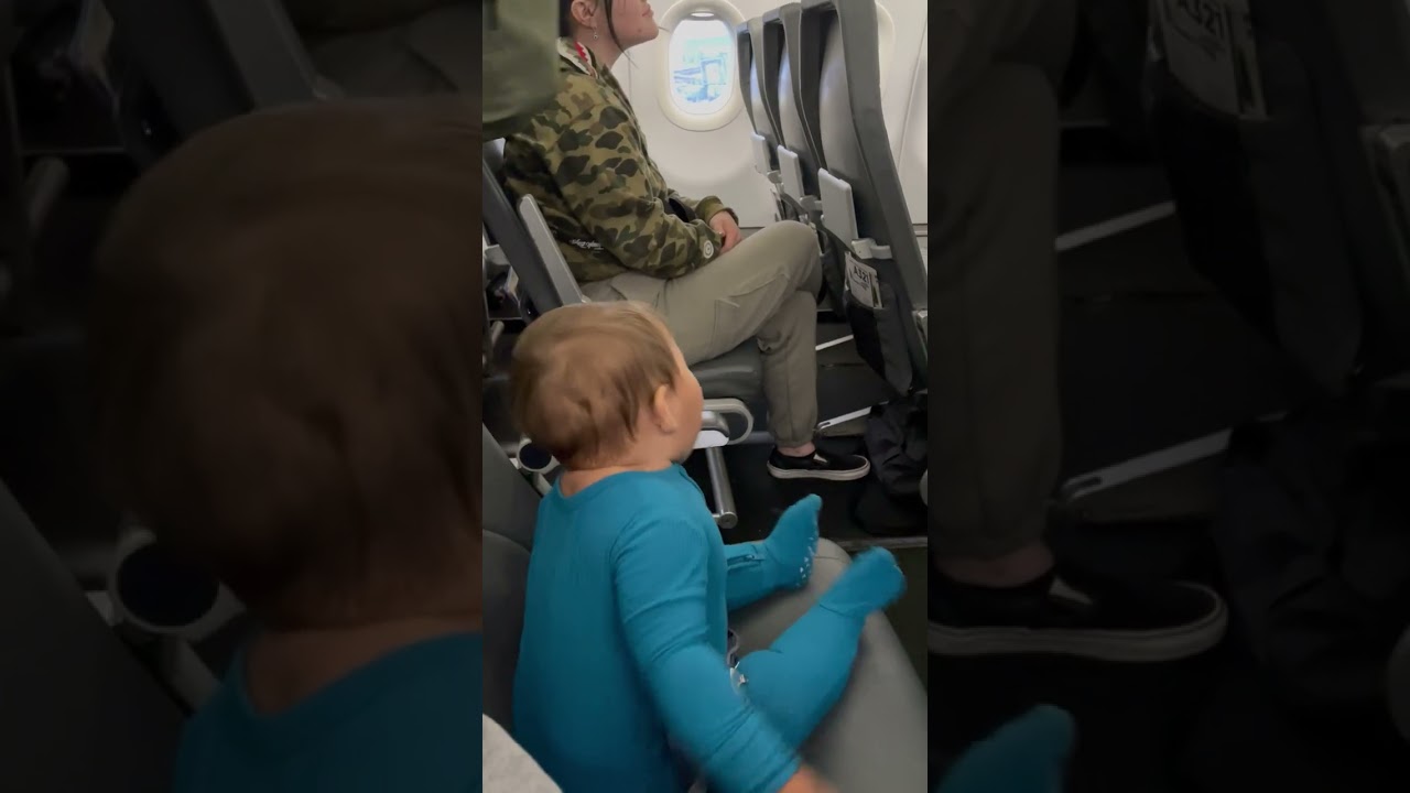 10-month-old delights passengers on delayed flight