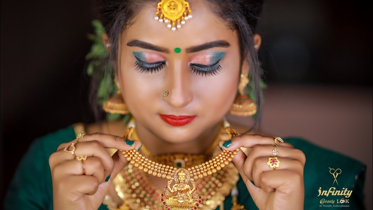 Infinity beauty look | kerala wedding makeup | sarika vinayak