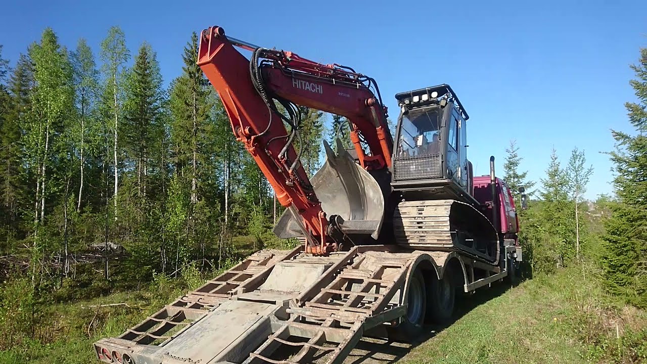 Sisu Cummins L10 Loaded with Hitachi 135 USL