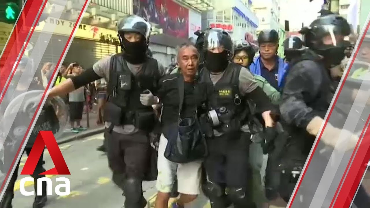 Hong Kong protests: Police make arrests as rallies erupt across city, shops vandalised