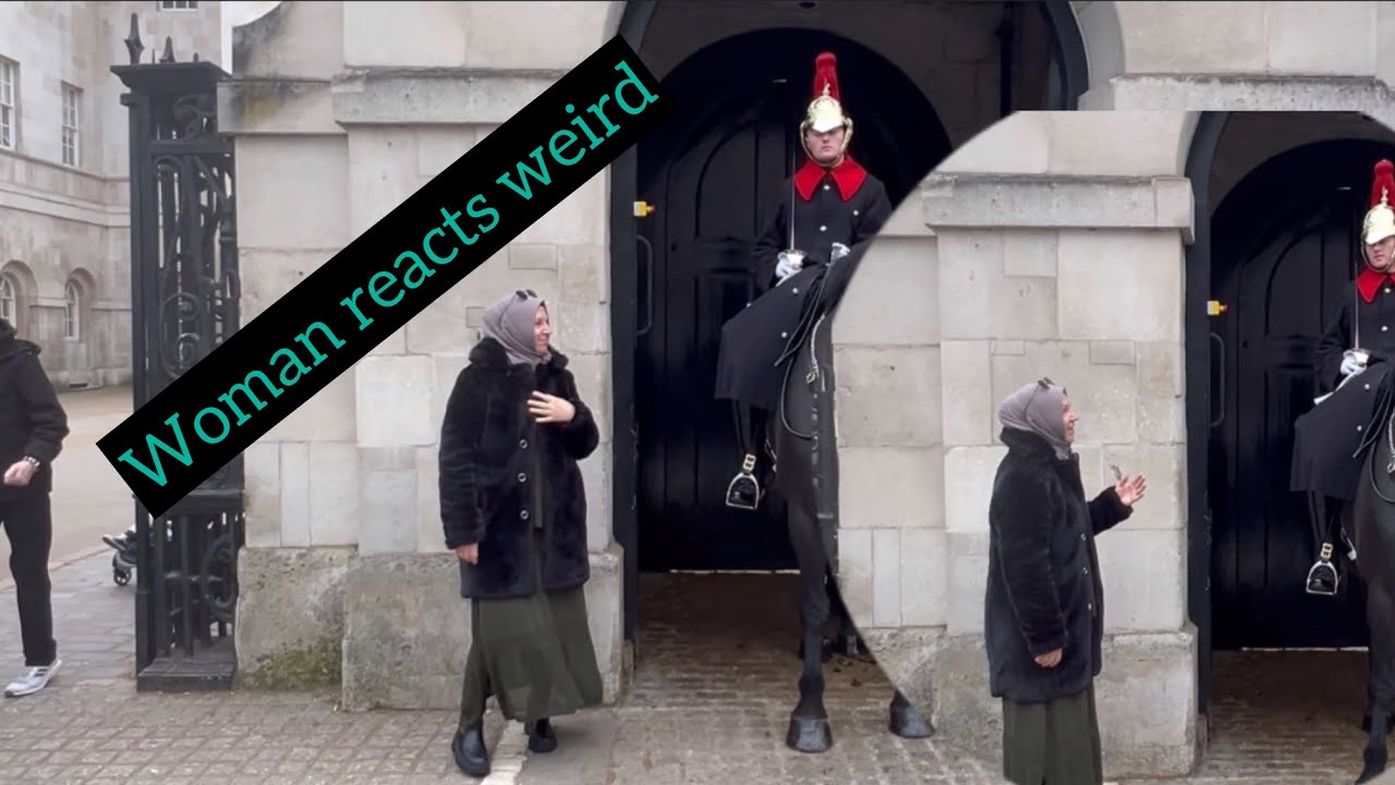 The Woman reacts weird when warned by the guard