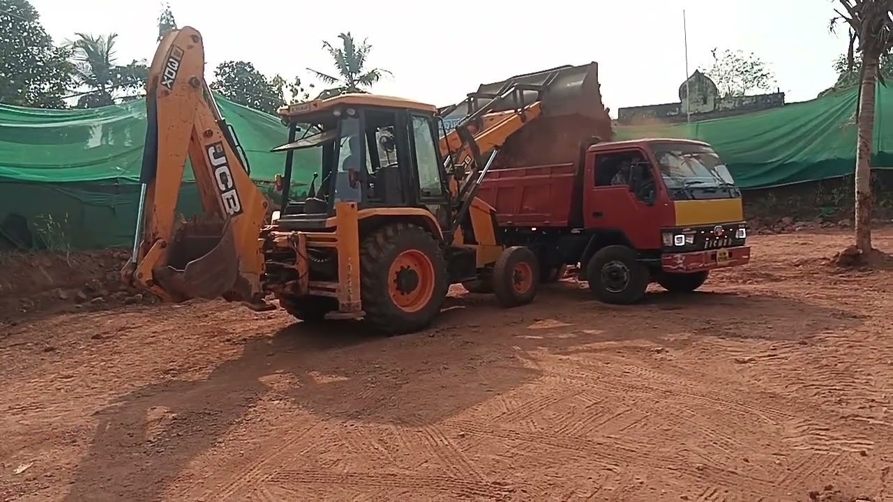 Jcb 3dx मिट्टी loding